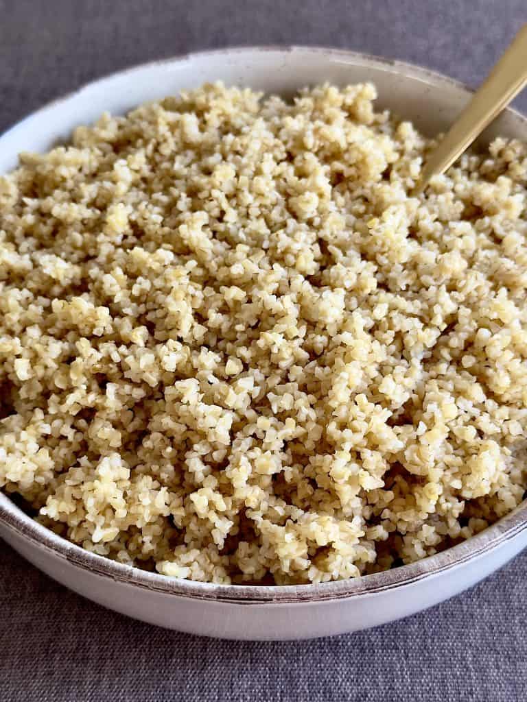 Cooked bulgur wheat in a bowl