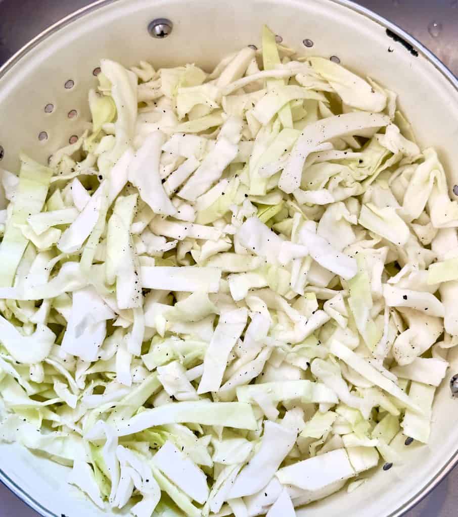 Shredded cabbage in a sieve